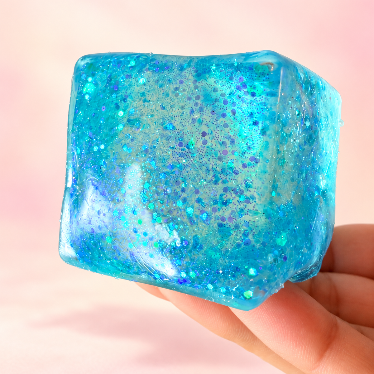 Glitter cube squishy — bright background